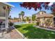 Home's backyard features a pool, greenery, shed, and privacy at 248 Hyssop Ct, Henderson, NV 89015