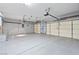 Spacious and well-lit three-car garage, offering ample parking and storage space at 248 Hyssop Ct, Henderson, NV 89015