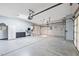 Bright and expansive three-car garage with ample open space and side storage area at 248 Hyssop Ct, Henderson, NV 89015
