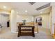 Upstairs hallway featuring a decorative table and views into adjacent bedrooms at 248 Hyssop Ct, Henderson, NV 89015
