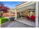 Home's covered patio provides a shady spot to relax outdoors at 248 Hyssop Ct, Henderson, NV 89015