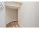 Curved staircase with carpeted steps leading to the upper level at 248 Hyssop Ct, Henderson, NV 89015