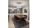 Dining room has modern chandelier and seating for six at 2484 Domingo St, Las Vegas, NV 89121