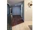 Welcoming entryway featuring wood floors and a neutral color palette, creating a warm and inviting atmosphere at 2484 Domingo St, Las Vegas, NV 89121