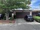 Charming home featuring a front lawn, two-car garage, and well-maintained landscaping at 2484 Domingo St, Las Vegas, NV 89121