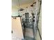 Stylish shower featuring dual shower heads, geometric tile, and built-in storage niches at 2484 Domingo St, Las Vegas, NV 89121