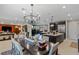 Open concept dining room flows into living room and kitchen, perfect for modern living at 2518 Veronella St, Henderson, NV 89044