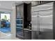Stainless steel refrigerator and oven and access to the patio are the highlights of this efficient kitchen at 2518 Veronella St, Henderson, NV 89044