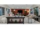 Open-concept living room with stylish decor, designer furnishings, and abundant natural light at 2518 Veronella St, Henderson, NV 89044