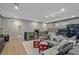 Upper living room featuring comfortable seating, dice ottomans, and modern decor at 2518 Veronella St, Henderson, NV 89044