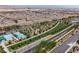 An aerial view highlights the neighborhood pool, park, and meticulously maintained landscaping at 2606 Marvel Astoria St, Henderson, NV 89044