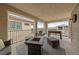 Spacious balcony with an outdoor fire pit and comfortable seating, perfect for enjoying scenic views and relaxation at 2606 Marvel Astoria St, Henderson, NV 89044