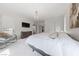 Spacious primary bedroom with large bed, dresser, and access to private balcony at 2606 Marvel Astoria St, Henderson, NV 89044