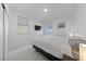 Clean bedroom featuring a queen size bed, two windows, and closet with modern furnishings at 2606 Marvel Astoria St, Henderson, NV 89044