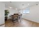 Bright dining area features modern furniture and a window, perfect for entertaining and relaxing at 2606 Marvel Astoria St, Henderson, NV 89044