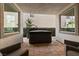 A covered patio featuring a hot tub for relaxation and entertainment at 2606 Marvel Astoria St, Henderson, NV 89044