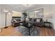 Relaxing living room with plush sofas, contemporary lighting, and a cozy rug at 2606 Marvel Astoria St, Henderson, NV 89044