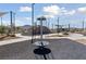 Community merry-go-round feature with surrounding sidewalks and grassy areas at 2606 Marvel Astoria St, Henderson, NV 89044