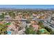 Enjoy neighborhood with mature landscaping and views of the city from the air at 2771 S Buffalo Dr, Las Vegas, NV 89117
