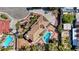 An overhead view of a luxury home featuring a pool, landscaping, and a large driveway and solar panels at 2771 S Buffalo Dr, Las Vegas, NV 89117