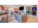 Spacious living room with hardwood floors, comfortable seating, and access to a sound recording room at 2771 S Buffalo Dr, Las Vegas, NV 89117