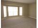 Bright and airy living space with a bay window offering plenty of natural light, creating a cozy atmosphere at 2830 Queens Courtyard Dr, Las Vegas, NV 89109