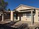 Well-kept backyard featuring a covered patio area, desert landscaping, and privacy at 2839 Kensington St, Las Vegas, NV 89156