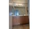 The bathroom features a double sink vanity and a mirror for a convenient and functional space at 2839 Kensington St, Las Vegas, NV 89156