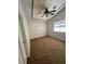 Bright bedroom featuring a ceiling fan, vaulted ceiling, and a window for natural light at 2839 Kensington St, Las Vegas, NV 89156