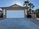 Charming single-story home with a two car garage and desert landscaping at 2839 Kensington St, Las Vegas, NV 89156