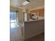 The kitchen features white appliances and dining area at 2839 Kensington St, Las Vegas, NV 89156
