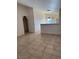 Open-concept living area, with tile floors at 2839 Kensington St, Las Vegas, NV 89156