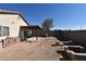 Backyard with covered patio providing a comfortable outdoor space and privacy fencing at 2845 Kensington St, Las Vegas, NV 89156