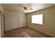 Carpeted bedroom with standard closet, white walls and bright lighting at 2845 Kensington St, Las Vegas, NV 89156