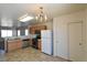 Well-lit kitchen featuring stainless appliances and view to eat in dining area at 2845 Kensington St, Las Vegas, NV 89156