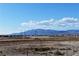 Expansive desert landscape showcasing distant mountain views and a blue sky at 2845 Kensington St, Las Vegas, NV 89156