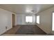 Cozy open-plan living room with tile and carpet flooring at 2845 Kensington St, Las Vegas, NV 89156