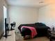 Bedroom with carpet, window, closet, and television at 2872 Atomic Tangerine Way # 2, Las Vegas, NV 89183