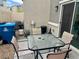 Cozy patio with a table and chairs, offering an inviting outdoor space for relaxation and entertainment at 2872 Atomic Tangerine Way # 2, Las Vegas, NV 89183