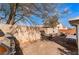 Large backyard with brick pavers, an outdoor grill, plenty of seating, and mature trees at 2903 Galena Peak Ln, Las Vegas, NV 89156