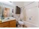 Inviting bathroom featuring sink, toilet, and shower with curtain, creating a functional space at 2903 Galena Peak Ln, Las Vegas, NV 89156