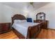 Bedroom with a bed, dresser, and wood floors at 2903 Galena Peak Ln, Las Vegas, NV 89156