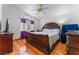 Primary bedroom featuring a decorative ceiling fan and natural light at 2903 Galena Peak Ln, Las Vegas, NV 89156