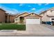 Charming single-story home with a two-car garage and well-maintained lawn at 2903 Galena Peak Ln, Las Vegas, NV 89156