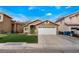 Charming single-story home with a two-car garage and well-maintained lawn at 2903 Galena Peak Ln, Las Vegas, NV 89156