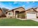 Charming single-story home with a two-car garage and well-maintained lawn at 2903 Galena Peak Ln, Las Vegas, NV 89156