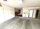 Spacious garage with ample storage cabinets, providing organized space for vehicles and belongings at 2925 Big Green Ln, Las Vegas, NV 89134