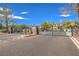Community entrance gate providing security and privacy for residents at 3058 Tarpon Dr # 103, Las Vegas, NV 89120