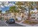 Exterior view of building with parking, landscaping and visible unit number at 3058 Tarpon Dr # 103, Las Vegas, NV 89120
