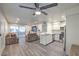 Open living area with modern finishes, seamlessly connecting the kitchen and living room at 3058 Tarpon Dr # 103, Las Vegas, NV 89120